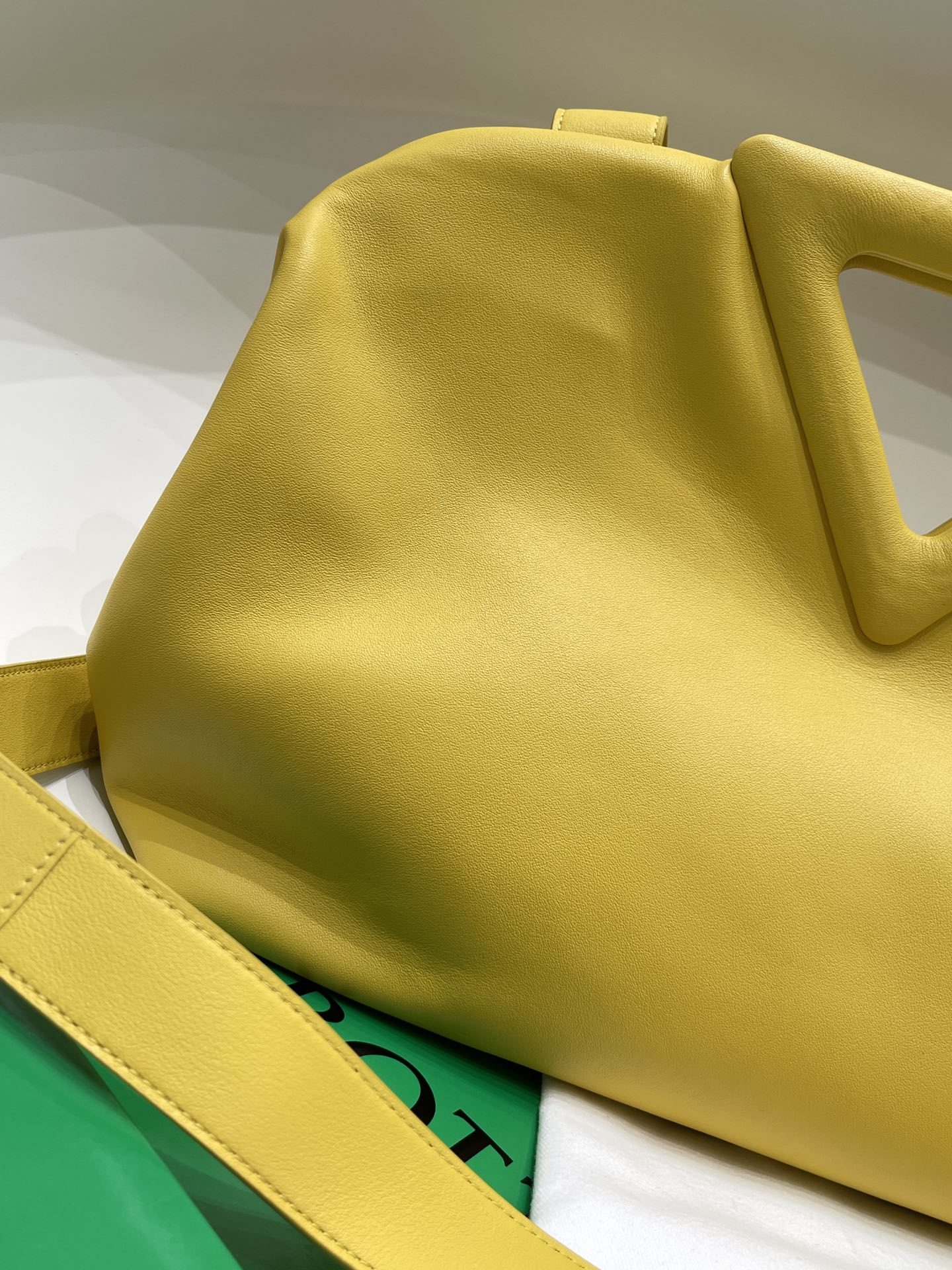 TRIANGLE HANDLE BAG 31 IN DANDELION YELLOW LAMBSKIN