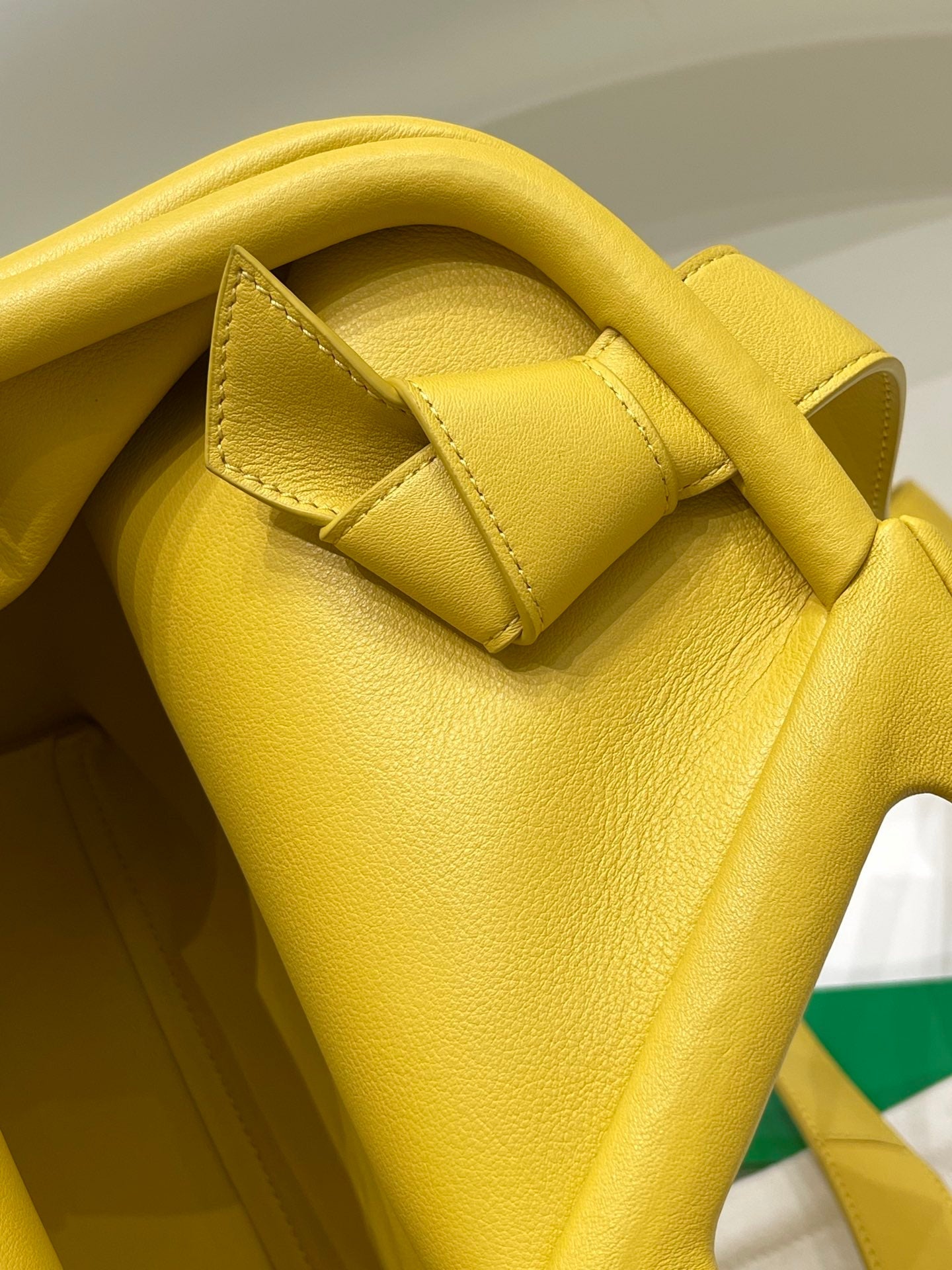 TRIANGLE HANDLE BAG 31 IN DANDELION YELLOW LAMBSKIN
