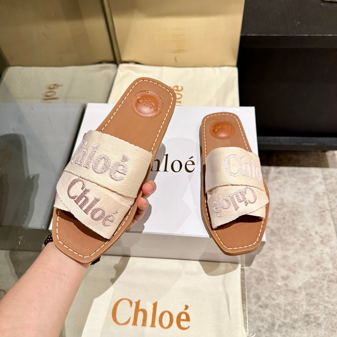 WOODY SLIDES IN BEIGE FABRIC WITH EMBROIDERED LOGO STRAPS