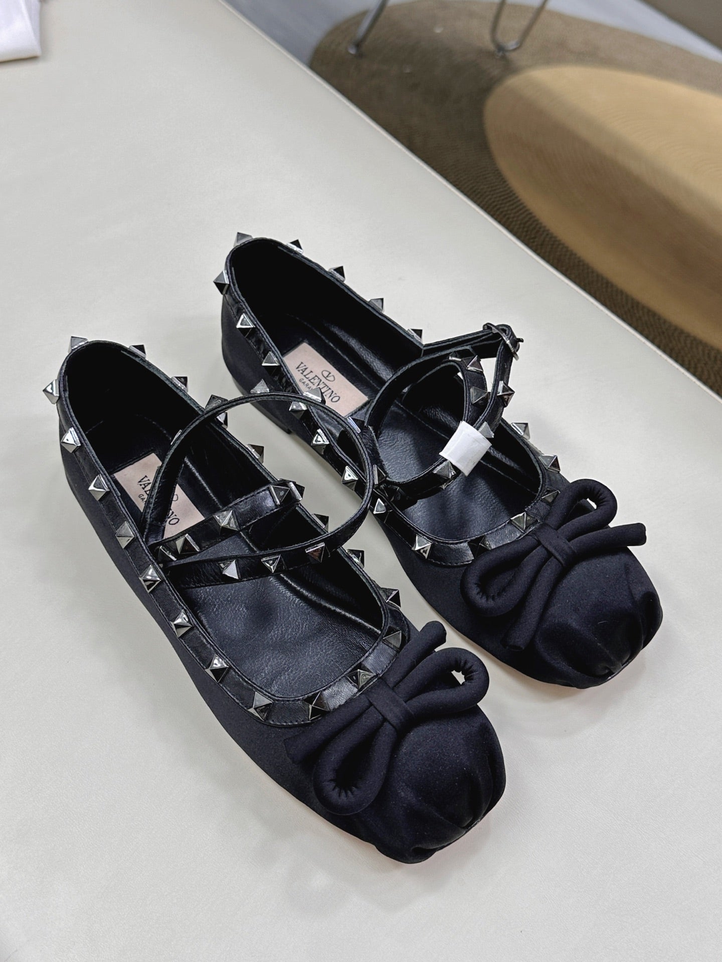 VALEN GARAVANI ROCKSTUD BALLERINAS IN BLACK SATIN
