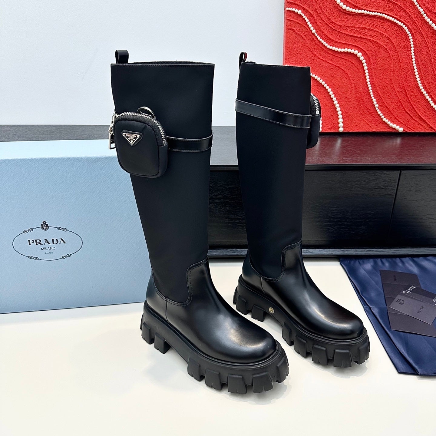 PRADA 25S BOOTS WITH POUCH IN BLACK CALFSKIN
