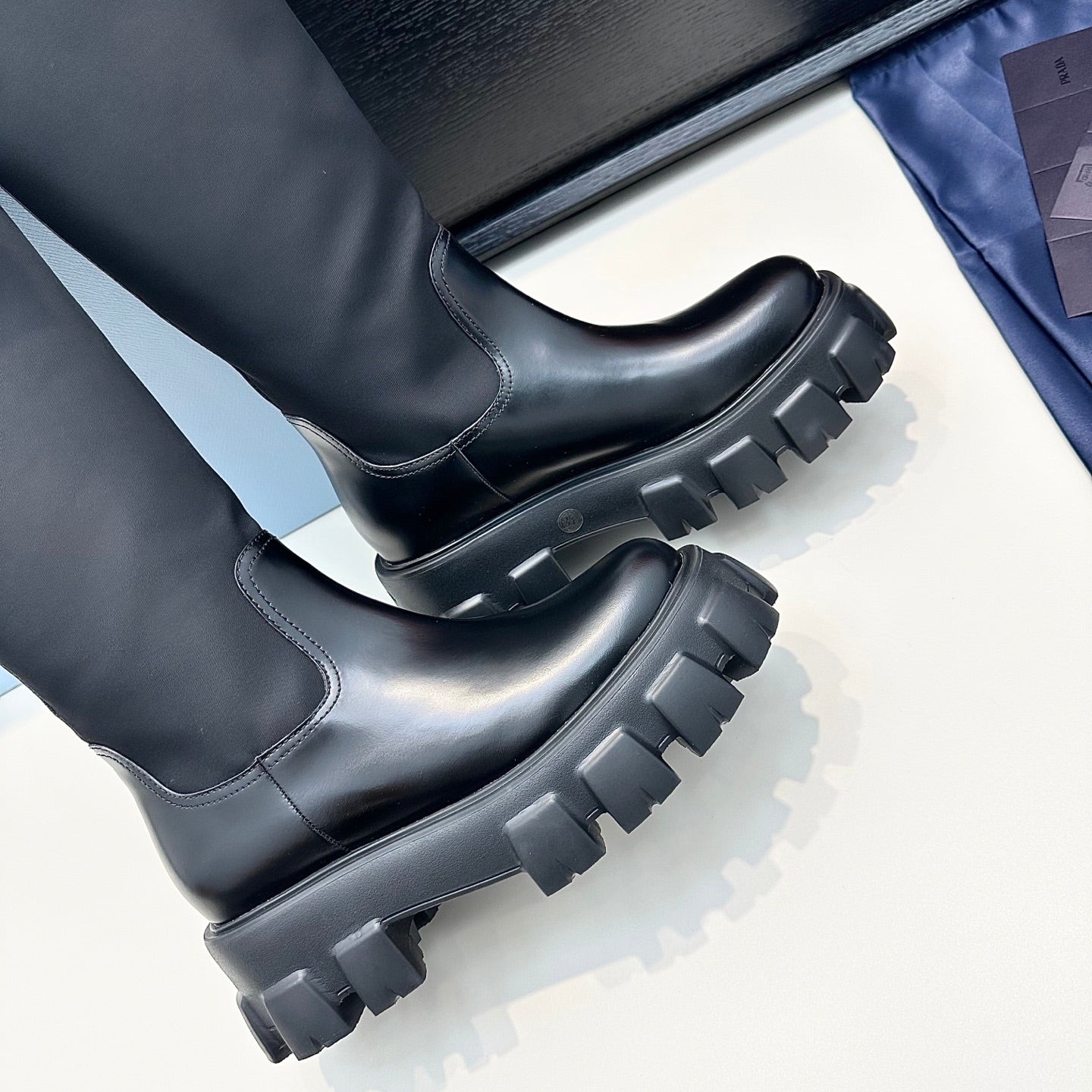 PRADA 25S BOOTS WITH POUCH IN BLACK CALFSKIN