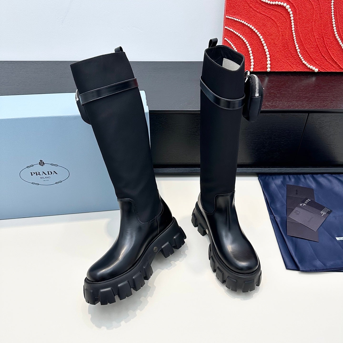 PRADA 25S BOOTS WITH POUCH IN BLACK CALFSKIN