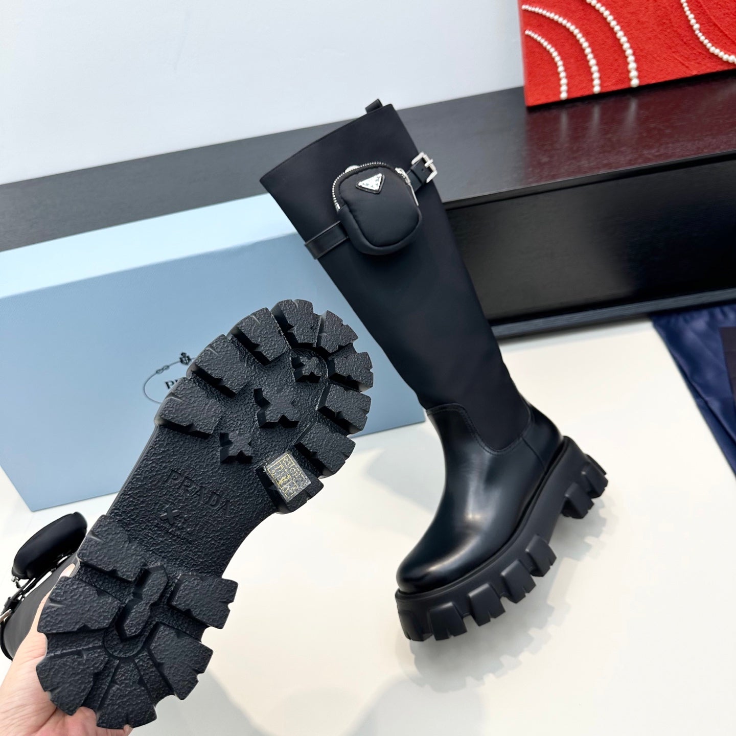PRADA 25S BOOTS WITH POUCH IN BLACK CALFSKIN