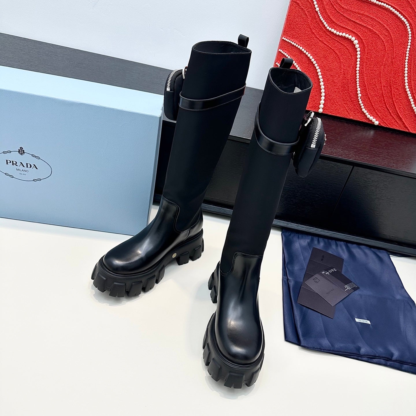 PRADA 25S BOOTS WITH POUCH IN BLACK CALFSKIN