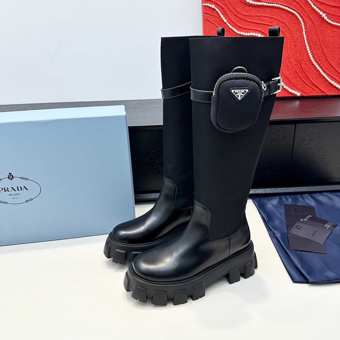 PRADA 25S BOOTS WITH POUCH IN BLACK CALFSKIN