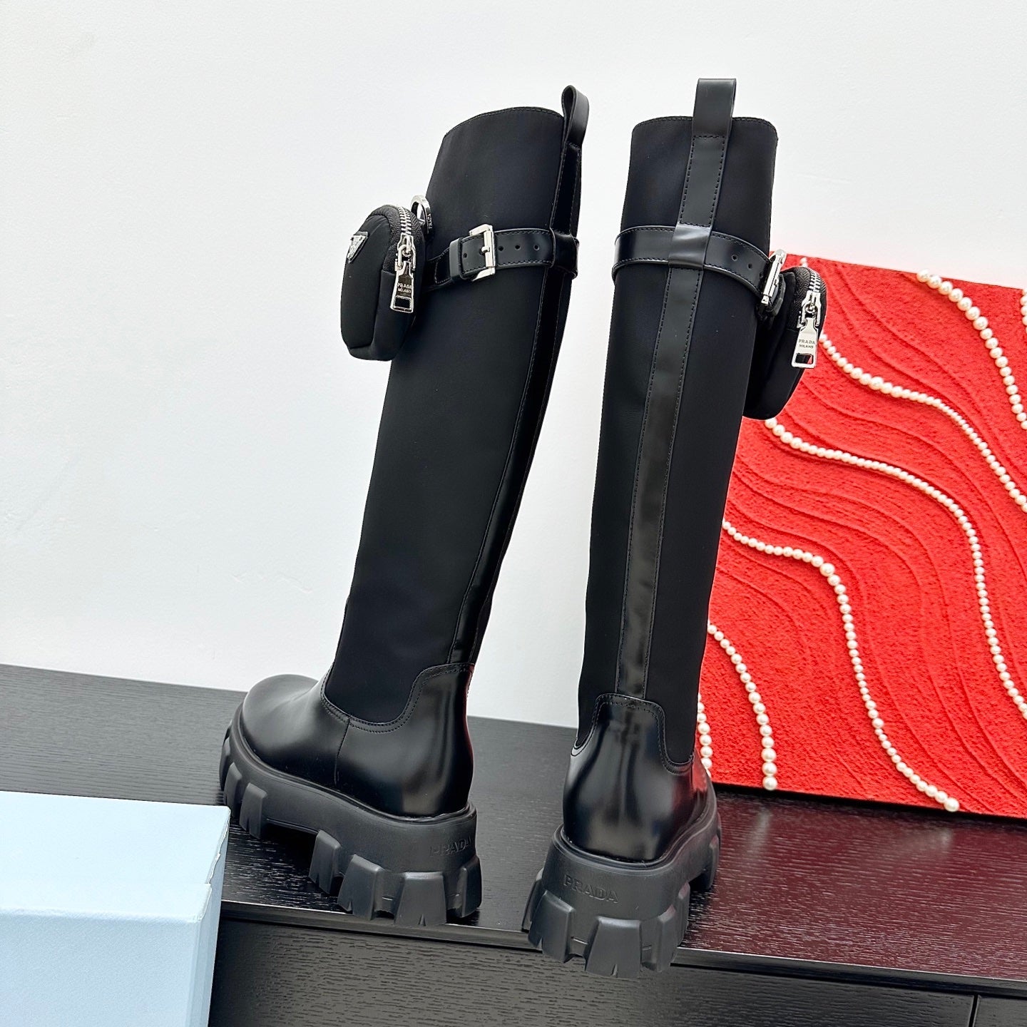 PRADA 25S BOOTS WITH POUCH IN BLACK CALFSKIN