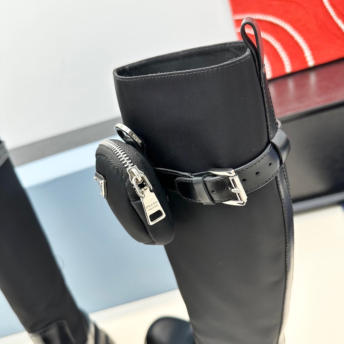 PRADA 25S BOOTS WITH POUCH IN BLACK CALFSKIN