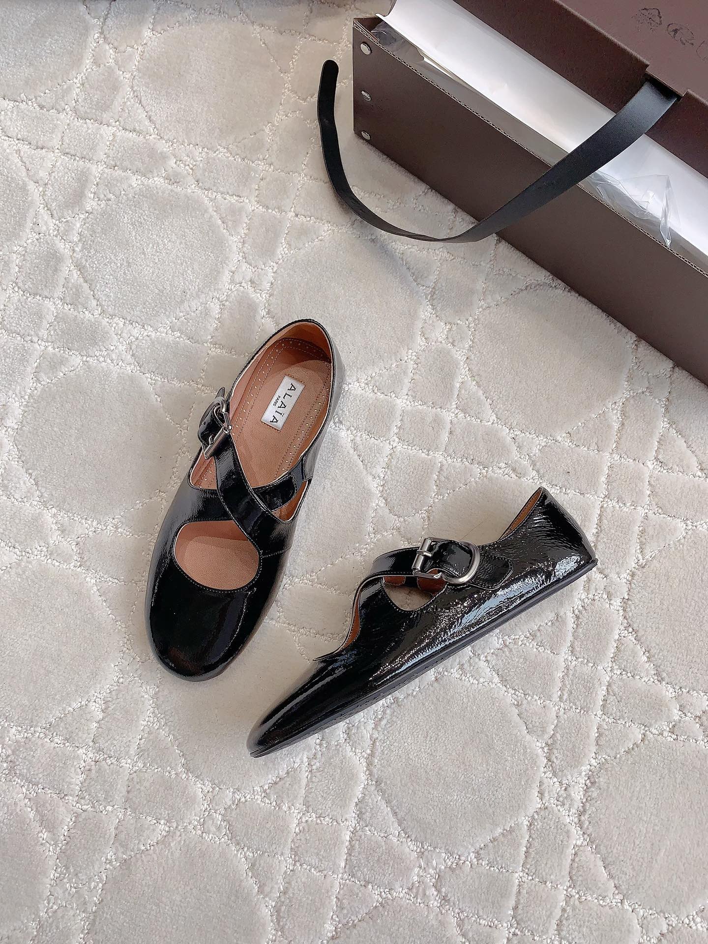 ALAIA CRISS CROSS BALLET FLAT IN BLACK LAMBSKIN WITH SILVER HARDWARE
