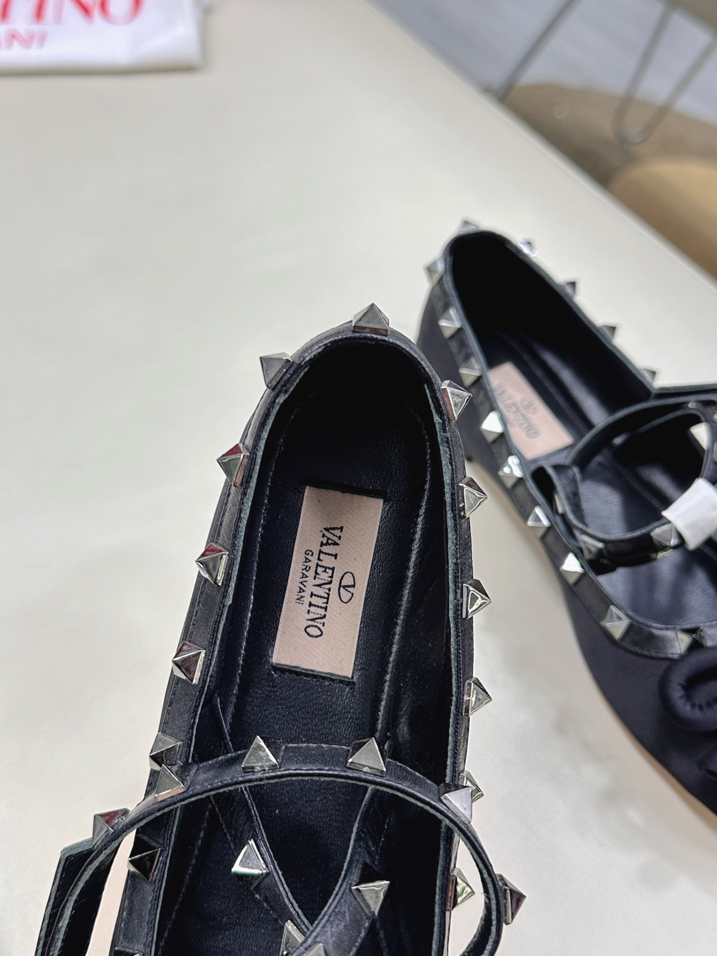 VALEN GARAVANI ROCKSTUD BALLERINAS IN BLACK SATIN