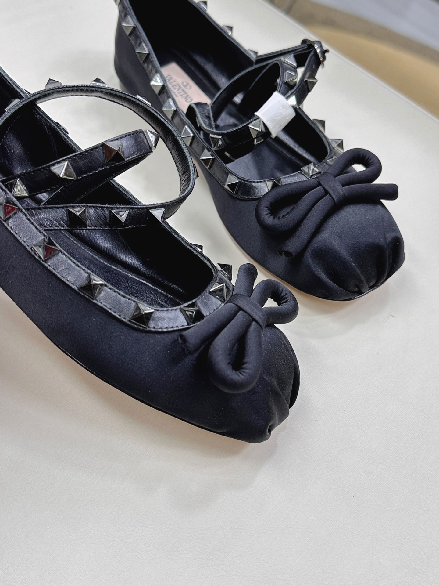 VALEN GARAVANI ROCKSTUD BALLERINAS IN BLACK SATIN