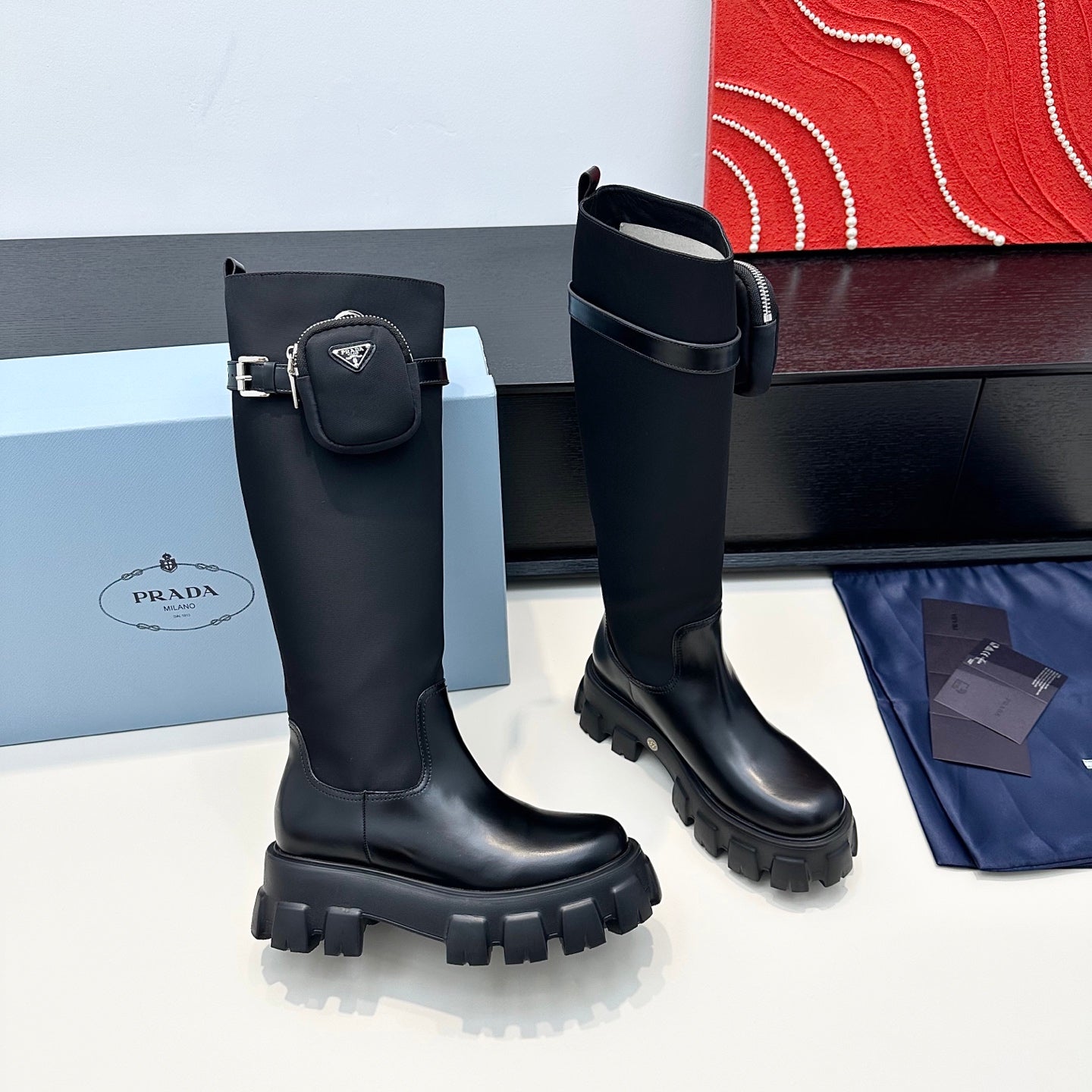 PRADA 25S BOOTS WITH POUCH IN BLACK CALFSKIN